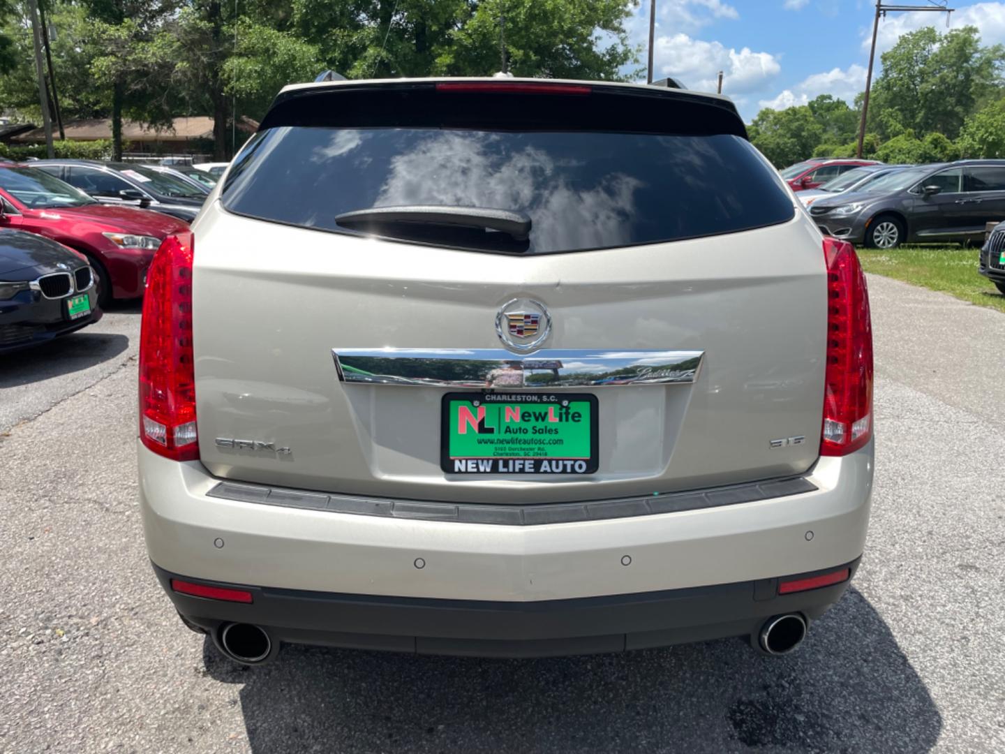 2016 SILVER CADILLAC SRX LUXURY COLLECTION (3GYFNEE33GS) with an 3.6L engine, Automatic transmission, located at 5103 Dorchester Rd., Charleston, SC, 29418-5607, (843) 767-1122, 36.245171, -115.228050 - Photo#5